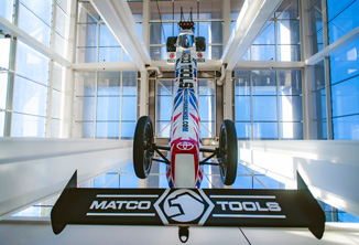 PRI Show Opens Image hanging car